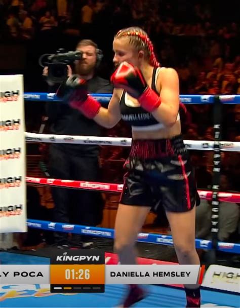 boxer flashes audience|Kingpyn Boxing video: Daniella Hemsley flashes fans after。